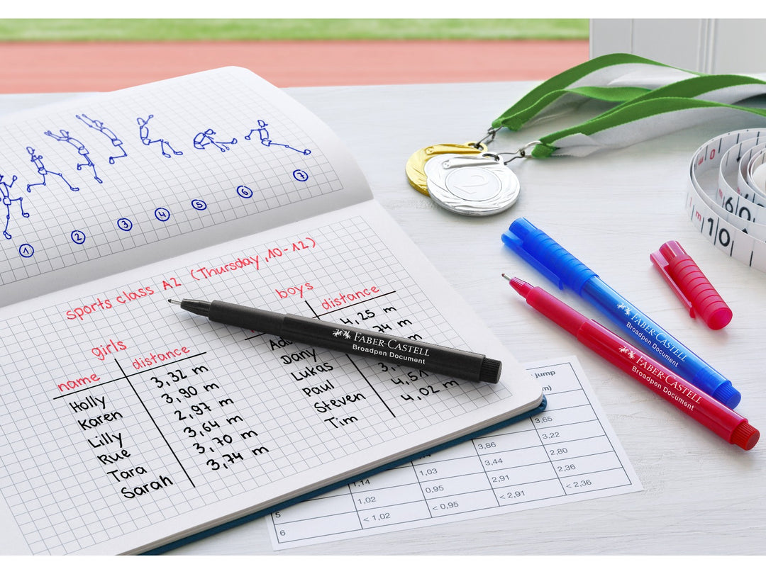 Faber-Castell Broadpen 1554 Fineliner in Blue being used for note-taking and colour-coded schoolwork, demonstrating the durable metal-clad 0.8mm tip, document-proof ink and smooth writing performance for study, organisation and everyday writing tasks.
