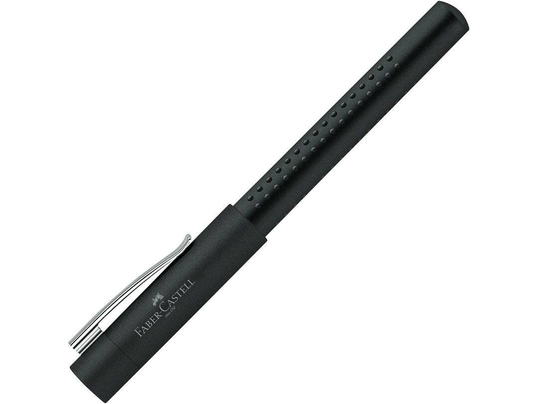 Faber-Castell Grip 2011 Fountain Pen in Black with cap fitted, featuring an ergonomic triangular barrel with patented Grip dots, durable metal pocket clip and contemporary matte black finish for comfortable everyday handwriting, journaling, note-taking and professional writing.