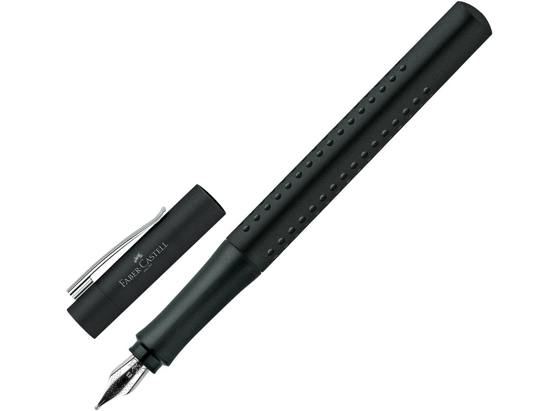 Faber-Castell Grip 2011 Fountain Pen in Black with cap removed, featuring an ergonomic triangular barrel with patented Grip dots, durable stainless steel broad nib, metal pocket clip and comfortable design for everyday handwriting, journaling, note-taking and professional writing.