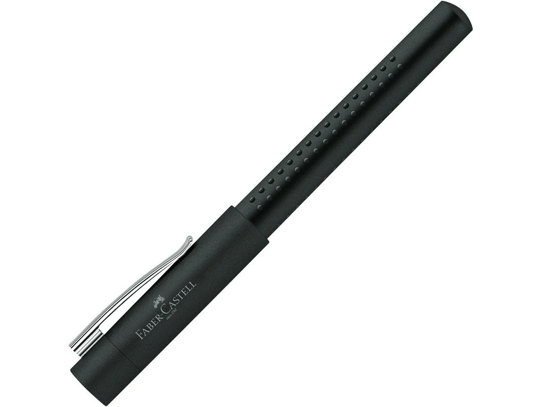 Faber-Castell Grip 2011 Ballpoint Pen in Black featuring an ergonomic triangular barrel with patented Grip dots, retractable push-button mechanism, durable metal pocket clip and smooth everyday writing performance for note-taking, journaling and professional use.