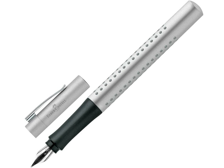 Faber-Castell Grip 2011 Fountain Pen in Silver with cap removed, featuring an ergonomic triangular barrel with patented Grip dots, durable stainless steel nib, metal pocket clip and comfortable design for everyday handwriting, journaling, note-taking and professional writing.