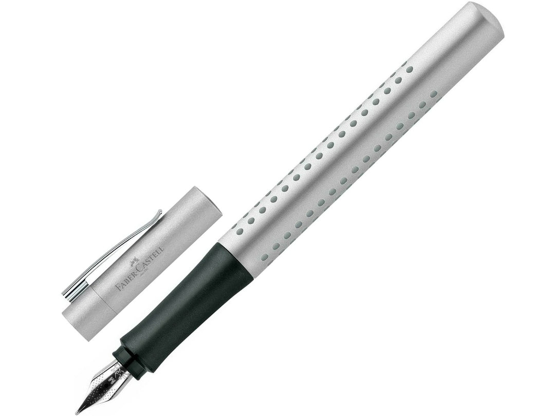 Faber-Castell Grip 2011 Fountain Pen in Silver with cap removed, featuring an ergonomic triangular barrel with patented Grip dots, durable stainless steel nib, metal pocket clip and comfortable design for everyday handwriting, journaling, note-taking and professional writing.