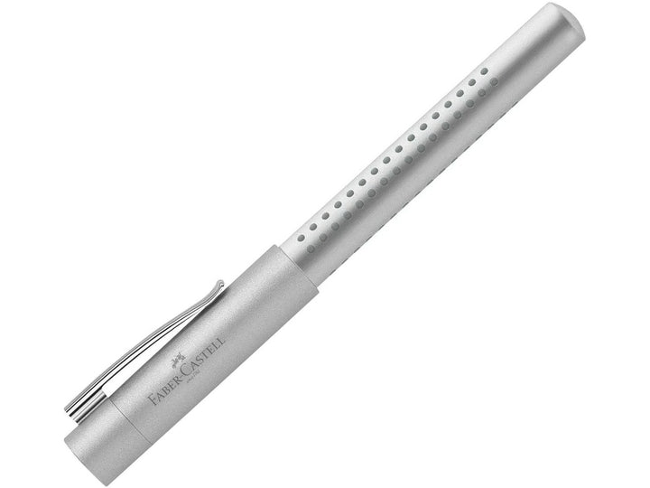 Faber-Castell Grip 2011 Fountain Pen in Silver with cap fitted, featuring an ergonomic triangular barrel with patented Grip dots, durable metal pocket clip and contemporary silver finish for everyday handwriting, journaling, note-taking and professional writing.