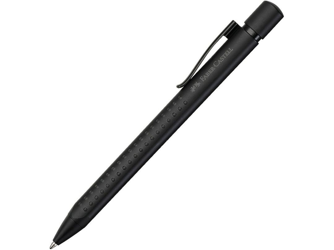Faber-Castell Grip Edition Ballpoint Pen in Black featuring a matte black barrel with ergonomic Grip dots, retractable push-button mechanism, durable metal pocket clip and smooth everyday writing performance for note-taking, journaling and professional use.