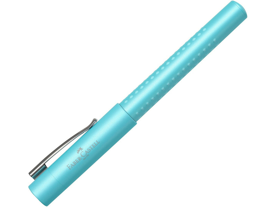 Faber-Castell Grip Pearl Edition Fountain Pen in Turquoise with cap fitted, featuring a pearlescent turquoise barrel with ergonomic Grip dots, durable metal pocket clip and lightweight design for everyday handwriting, journaling, note-taking and professional writing.