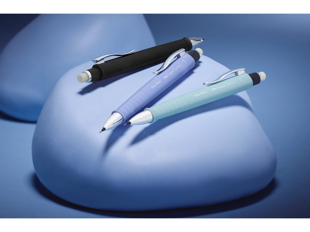 Faber-Castell Poly Matic Mechanical Pencils in Black, Lavender and Mint displayed together, showcasing the automatic lead advancement system, ergonomic soft-grip zones, extra-long twist erasers and metal pocket clips for uninterrupted writing, note-taking, sketching and everyday use.