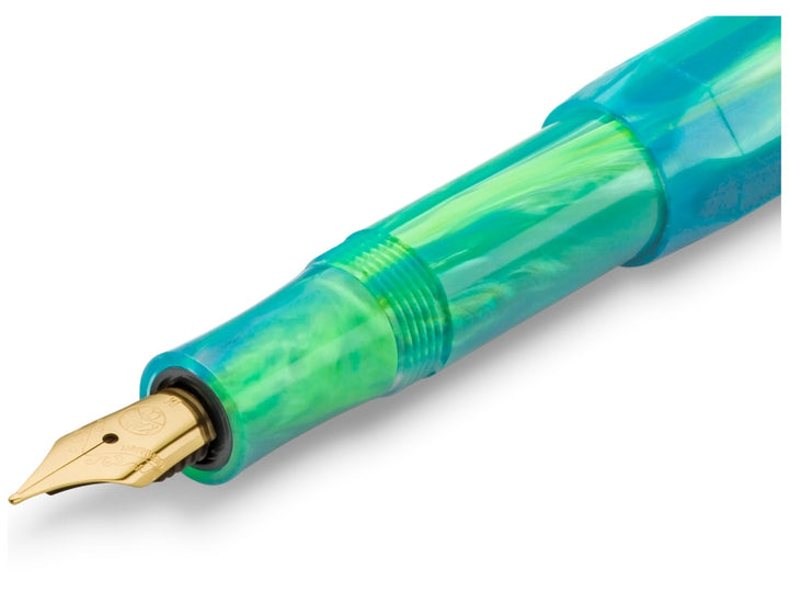 Detailed view of the Kaweco COLLECTION Marble Ocean fountain pen with swirling blue and green marbled finish and gold-plated nib