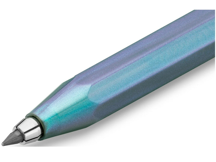 Close-up detail of the Kaweco LUNAR SPORT Clutch Pencil in Shadow Blue, showcasing the translucent blue barrel with shimmering turquoise and violet accents, faceted octagonal SPORT design, chrome clutch mechanism and exposed 3.2mm graphite lead