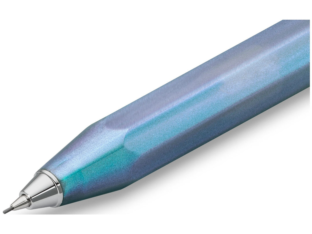 Close-up detail of the Kaweco LUNAR SPORT Mechanical Pencil in Shadow Blue, showcasing the translucent blue barrel with shimmering turquoise and violet accents, faceted octagonal Sport design, chrome nose cone and precision 0.7mm mechanical pencil tip