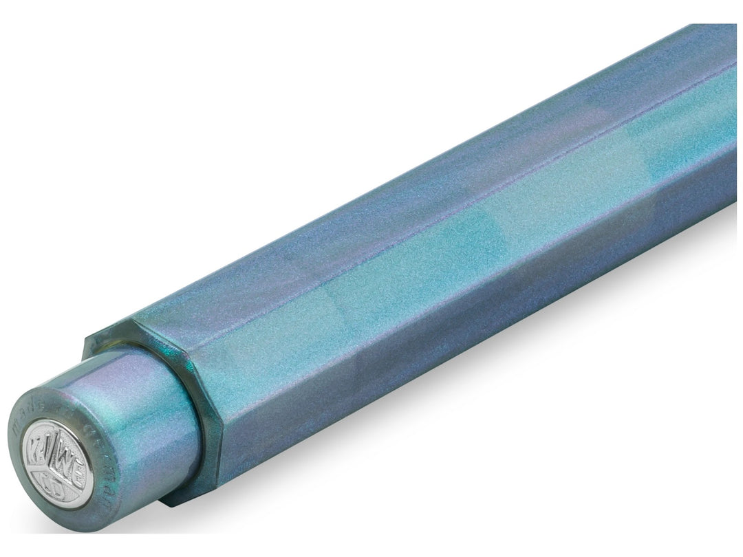 Close-up of the Kaweco LUNAR SPORT Mechanical Pencil in Shadow Blue, showcasing the translucent octagonal barrel with shimmering turquoise and violet accents, integrated push-button mechanism and silver Kaweco coin finial set into the end cap