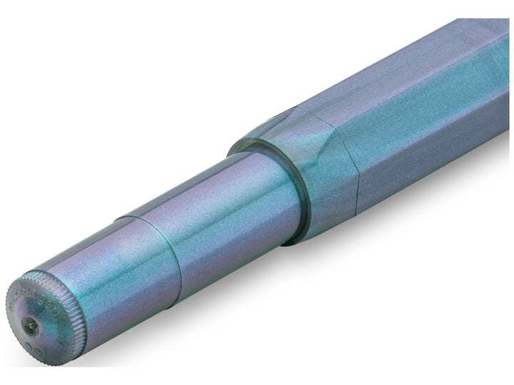 Close-up of the Kaweco LUNAR SPORT Rollerball Pen in Shadow Blue, showcasing the translucent octagonal barrel with shimmering turquoise and violet accents, visible internal rollerball refill, integrated cap threads and subtle pearlescent finish