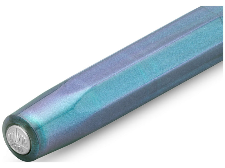 Kaweco LUNAR SPORT Rollerball Pen in Shadow Blue, showcasing the translucent octagonal cap with shimmering turquoise and violet accents, subtle pearlescent finish and silver Kaweco coin finial integrated into the end of the cap