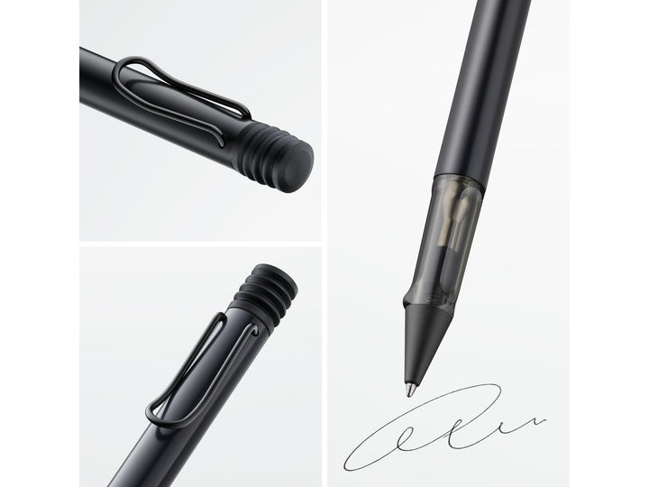 Close-up details of the LAMY AL-star ballpoint pen in Black, highlighting the self-sprung metal clip, translucent smoke-grey ergonomic grip section, anodised aluminium body and retractable ballpoint writing tip