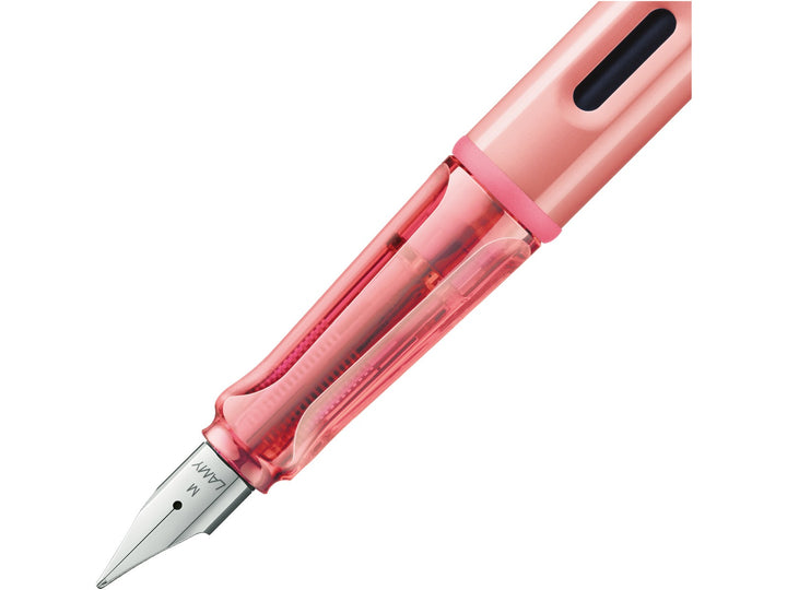 LAMY AL-star flamingo fountain pen close-up of stainless steel nib, transparent grip section and ink window