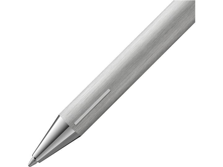 Close-up of the LAMY econ ballpoint pen in brushed stainless steel, highlighting the brushed metal body, minimalist design and precision ballpoint writing tip