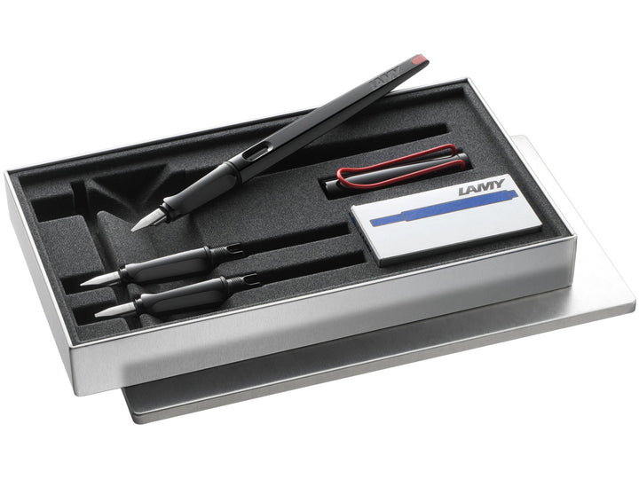 LAMY joy Calligraphy Set presentation box containing a calligraphy fountain pen, interchangeable 1.1mm, 1.5mm and 1.9mm nibs, and five LAMY T10 blue ink cartridges