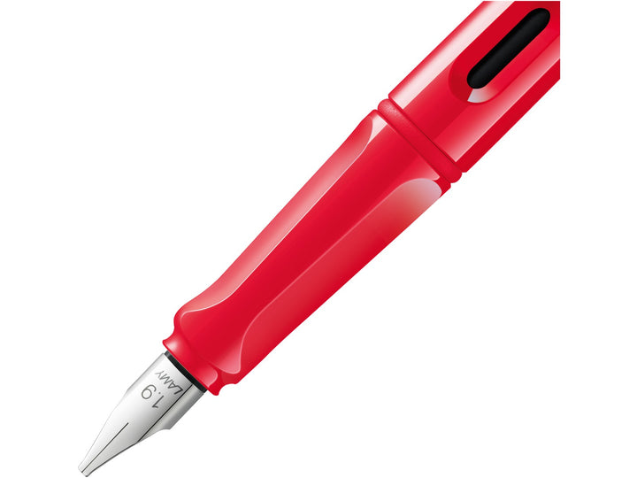 LAMY joy Strawberry calligraphy fountain pen grip section close-up with polished steel nib and integrated ink level window