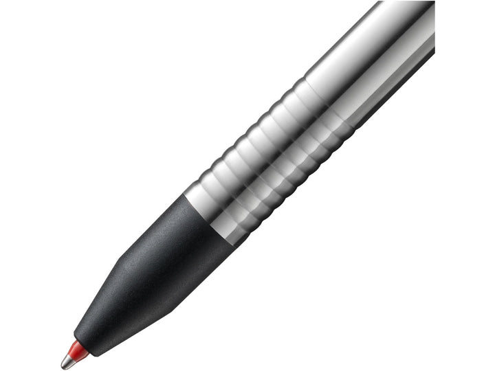 LAMY logo 3 Colours Multisystem Pen red ballpoint tip and textured grip section close-up