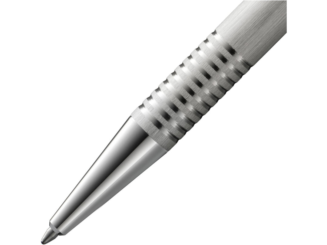 Close-up of the LAMY logo Ballpoint Pen in Brushed Stainless Steel featuring the polished metal cone tip, distinctive ribbed grip section and brushed stainless steel barrel construction