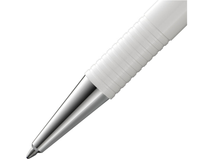 Close-up of the LAMY logo M+ Ballpoint Pen in White featuring the polished metal cone tip, distinctive ribbed grip section, crisp white barrel and durable lightweight construction