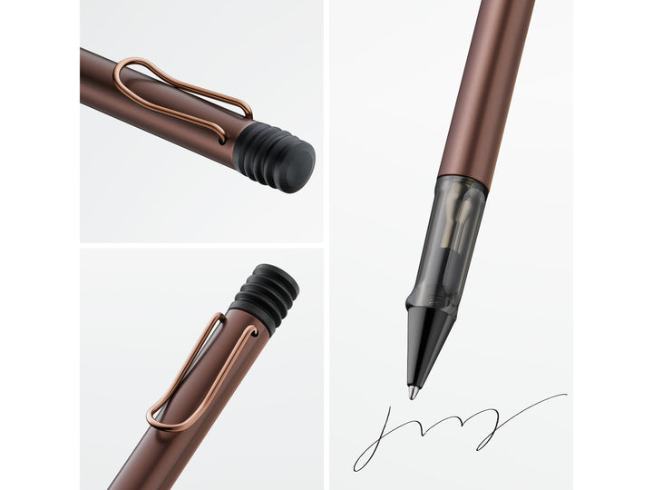 Close-up details of the LAMY Lx ballpoint pen in marron, highlighting the colour-matched metal clip, anodised aluminium barrel, transparent ergonomic grip section and precision ballpoint writing tip