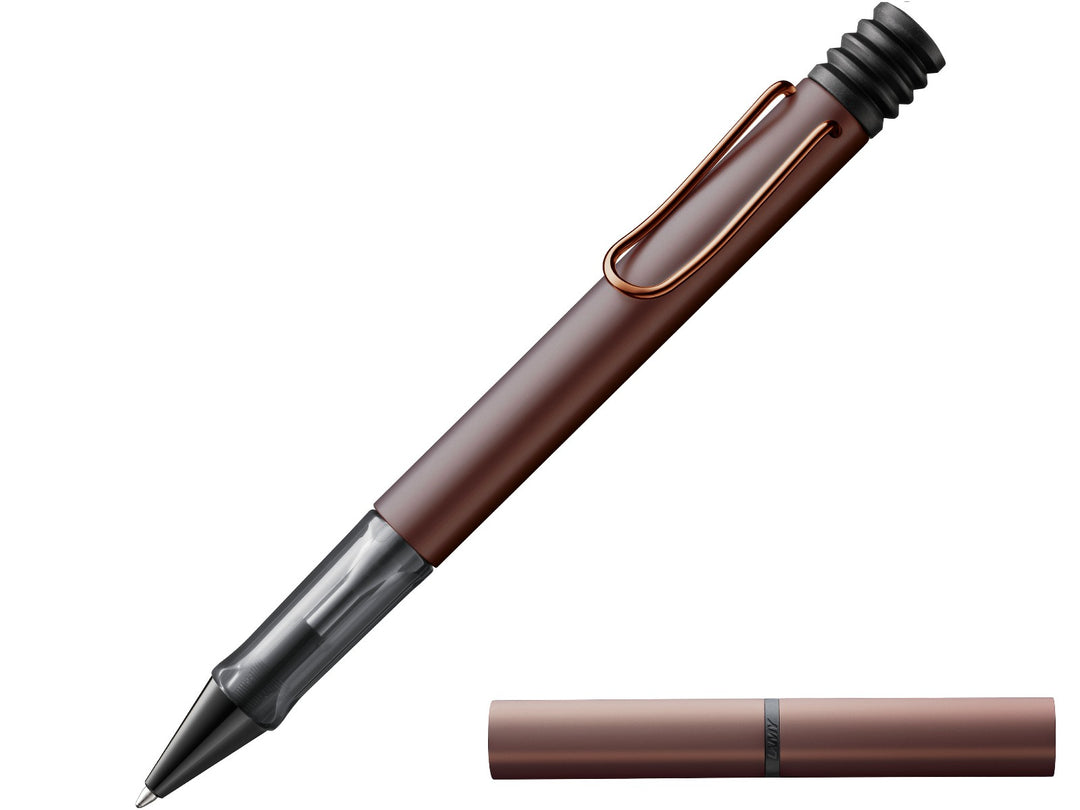 LAMY Lx ballpoint pen in marron with anodised aluminium body, transparent ergonomic grip, colour-matched metal clip and matching aluminium presentation case
