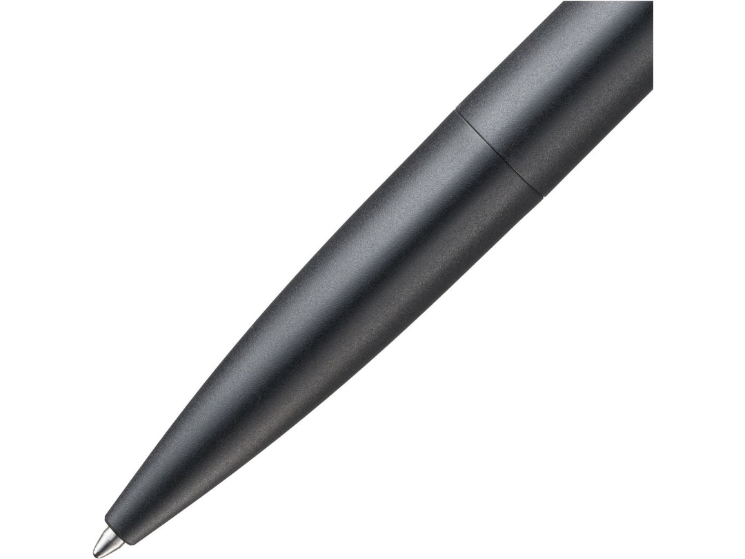 Close-up of the LAMY noto Ballpoint Pen Black featuring the black lower barrel, streamlined writing tip and minimalist monochrome design by Naoto Fukasawa