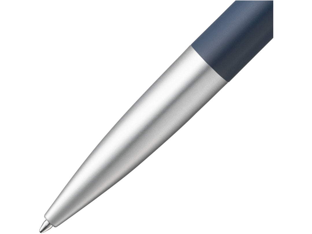 Close-up of the LAMY noto Ballpoint Pen in Blue-Silver featuring the streamlined silver lower barrel, tapered writing tip and contrasting blue upper barrel, showcasing the minimalist award-winning design by Naoto Fukasawa