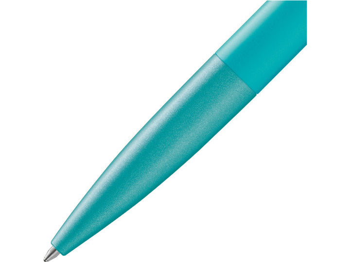 Close-up of the LAMY noto Ballpoint Pen in Turquoise featuring a textured turquoise barrel, streamlined tapered tip and minimalist award-winning design by Naoto Fukasawa