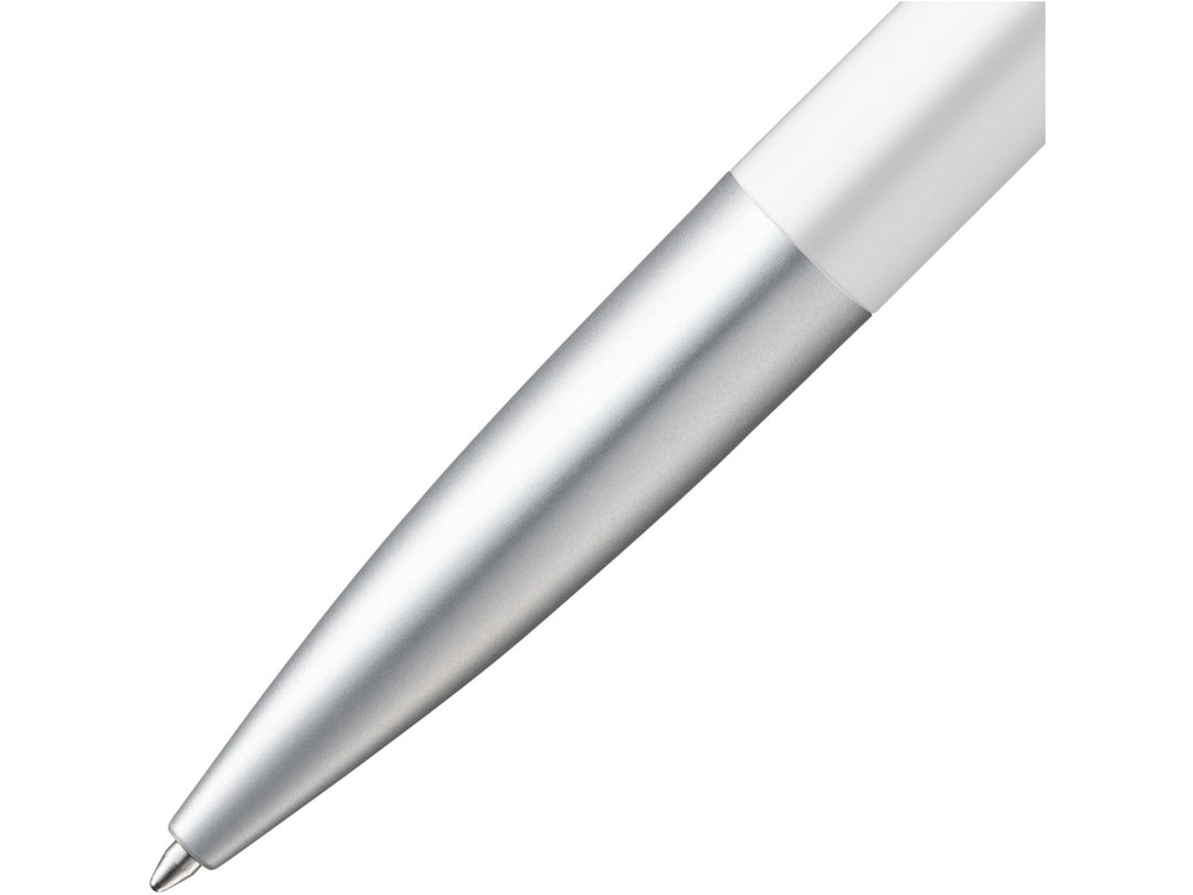 Close-up of the LAMY noto Ballpoint Pen in White-Silver featuring the streamlined silver lower barrel, tapered writing tip and contrasting white upper barrel, showcasing the minimalist award-winning design by Naoto Fukasawa