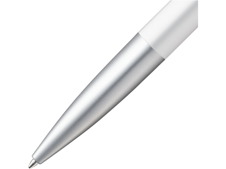 Close-up of the LAMY noto Ballpoint Pen in White-Silver featuring the streamlined silver lower barrel, tapered writing tip and contrasting white upper barrel, showcasing the minimalist award-winning design by Naoto Fukasawa