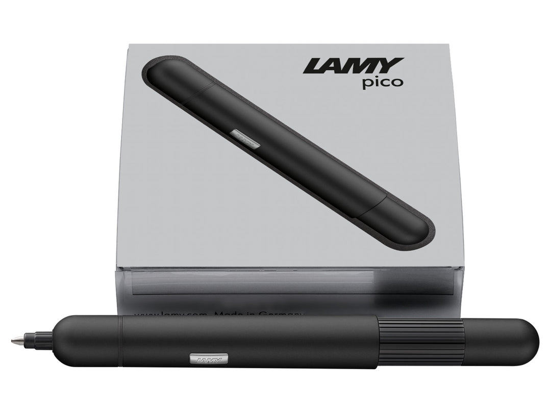 LAMY pico ballpoint pen in black displayed with LAMY presentation box, highlighting the compact pocket-sized design and innovative double push mechanism.