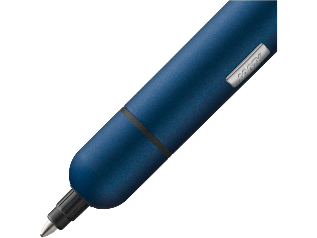 Close-up of the LAMY pico ballpoint pen in imperial blue, showing the extended writing tip, metallic blue finish and compact pocket-sized design