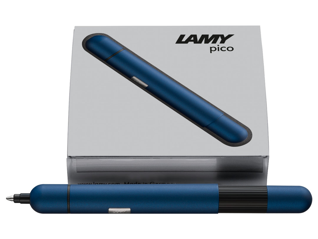 LAMY pico ballpoint pen in imperial blue displayed with LAMY presentation box, highlighting the compact pocket-sized design and innovative double push mechanism