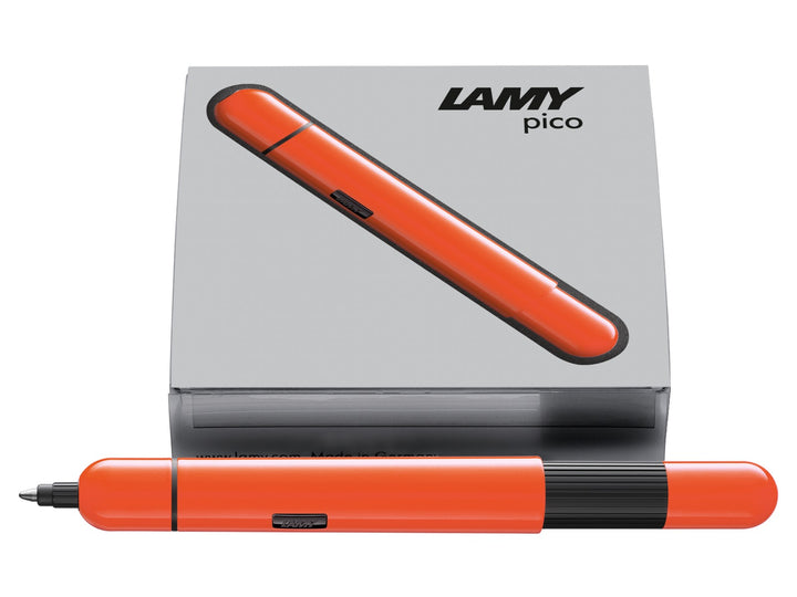 LAMY pico ballpoint pen in laser orange displayed with LAMY presentation box, highlighting the compact pocket-sized design and innovative double push mechanism.