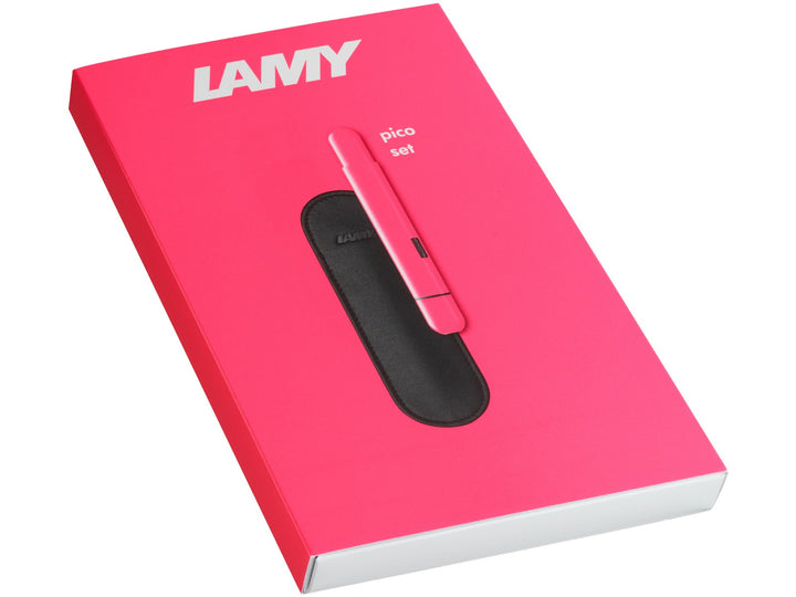 LAMY pico ballpoint pen set in neon pink with genuine leather pen pouch presented in a matching neon pink LAMY gift box.