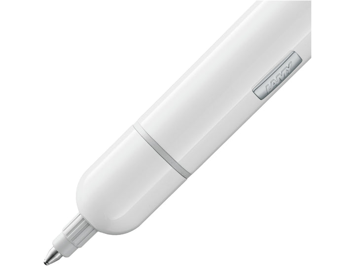 Close-up of the LAMY pico ballpoint pen in white, showing the extended writing tip, clean white finish and compact pocket-sized design