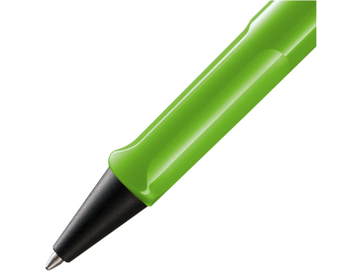Close-up of the LAMY safari Ballpoint Pen in Green featuring the ergonomic moulded grip section, black cone tip and durable ASA plastic construction