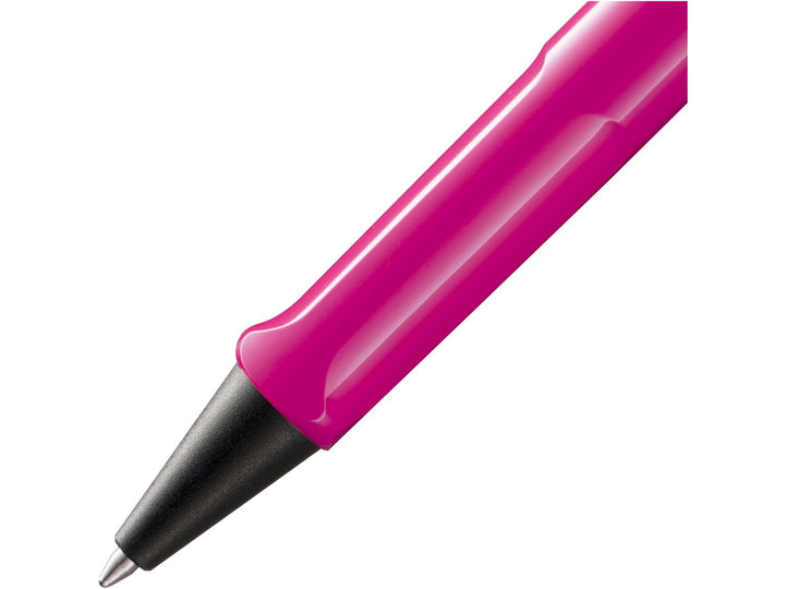 Close-up of the LAMY safari Ballpoint Pen in Pink featuring the ergonomic moulded grip section, black cone tip and durable ASA plastic construction