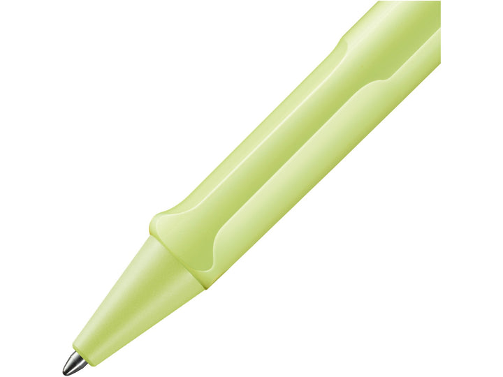 Close-up of the LAMY safari Ballpoint Pen in Spring Green featuring the ergonomic moulded grip section, matching Spring Green cone tip and durable ASA plastic construction