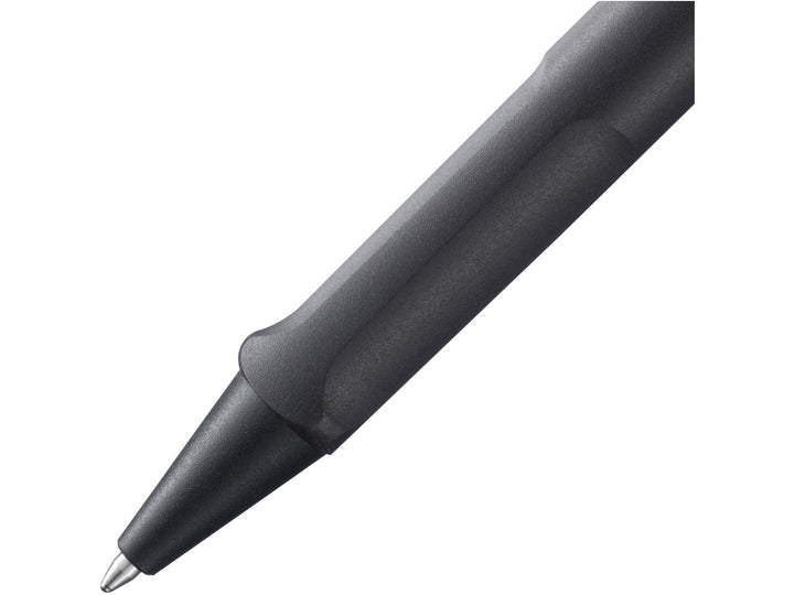 Close-up of the LAMY safari Ballpoint Pen in Umbra featuring the ergonomic moulded grip section, black cone tip and durable ASA plastic construction in a textured dark brown finish