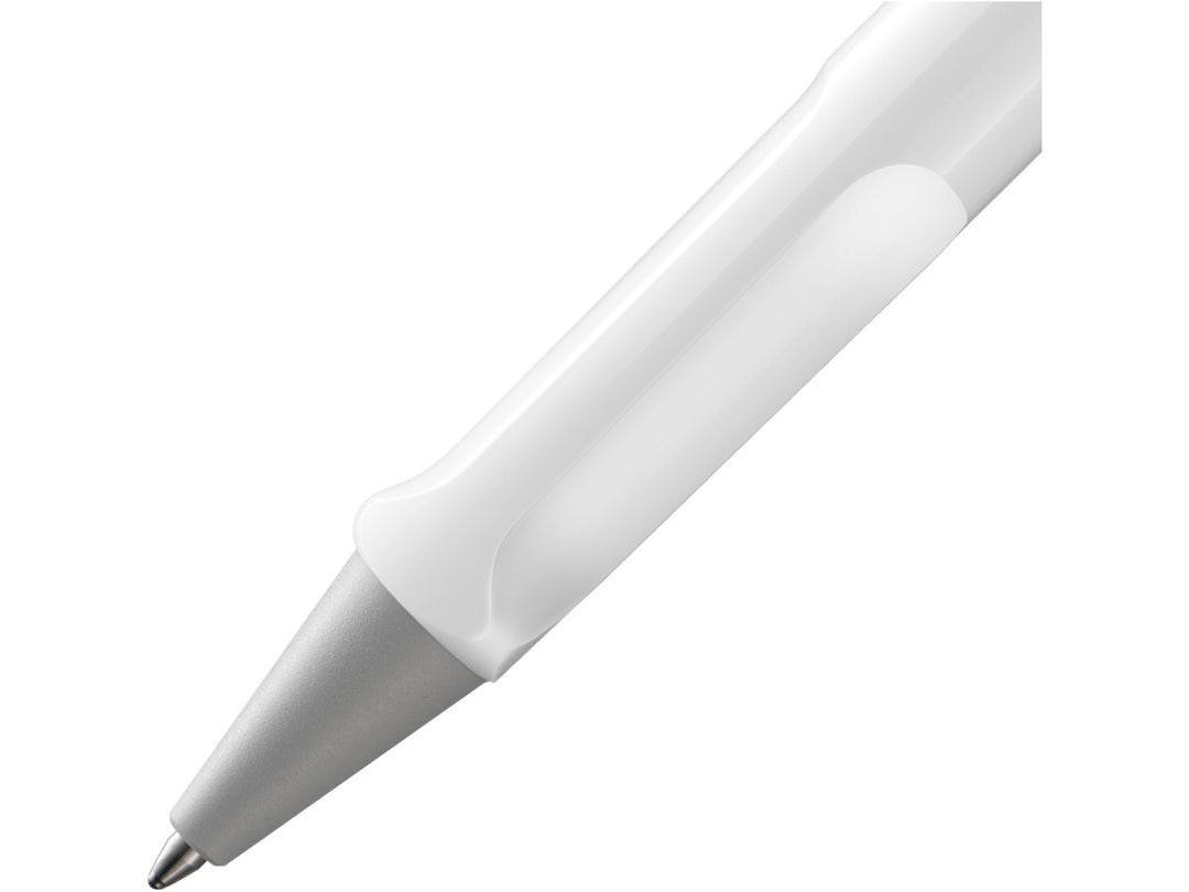 Close-up of the LAMY safari Ballpoint Pen in White featuring the ergonomic moulded grip section, brushed silver cone tip and durable ASA plastic construction