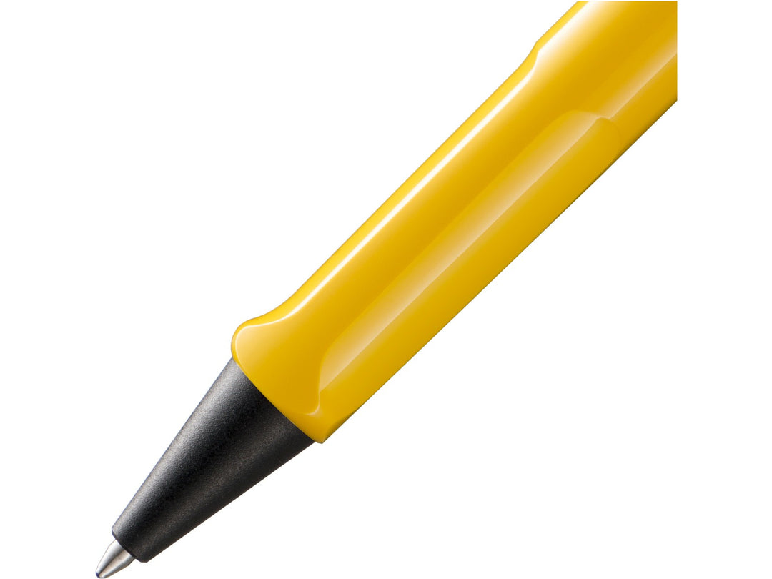 Close-up of the LAMY safari Ballpoint Pen in Yellow featuring the ergonomic moulded grip section, black cone tip and durable ASA plastic barrel