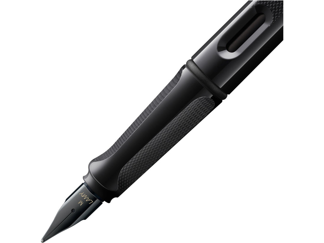 LAMY safari fountain pen Meteorite close-up of black stainless steel nib, ergonomic grip and ink level window