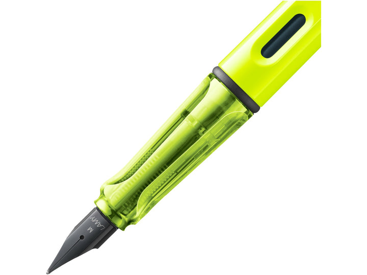 LAMY safari fountain pen Neon Yellow close-up of black stainless steel nib, ergonomic grip and ink level window