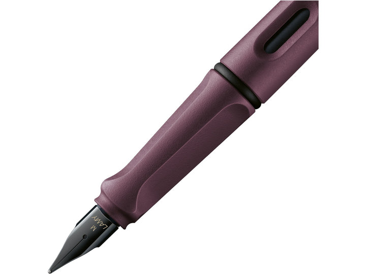 LAMY safari fountain pen Scarlet close-up of ergonomic grip, ink window and black stainless steel fountain pen nib