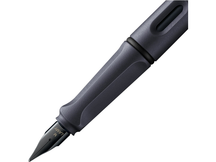 LAMY safari fountain pen Steel Black close-up of ergonomic grip, ink window and black stainless steel fountain pen nib