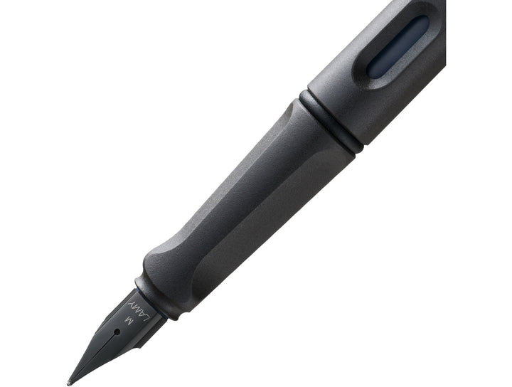 LAMY safari fountain pen Umbra close-up of ergonomic grip, ink window and black stainless steel fountain pen nib