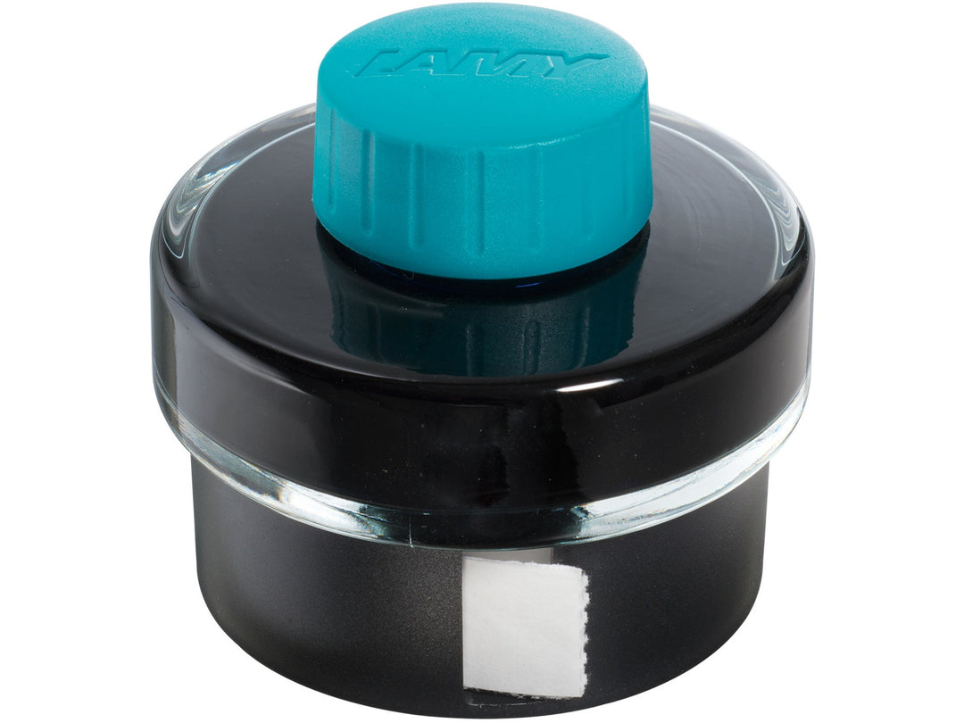 LAMY T52 Turquoise Fountain Pen Ink Bottle 50ml showing integrated blotting paper roll in bottle base