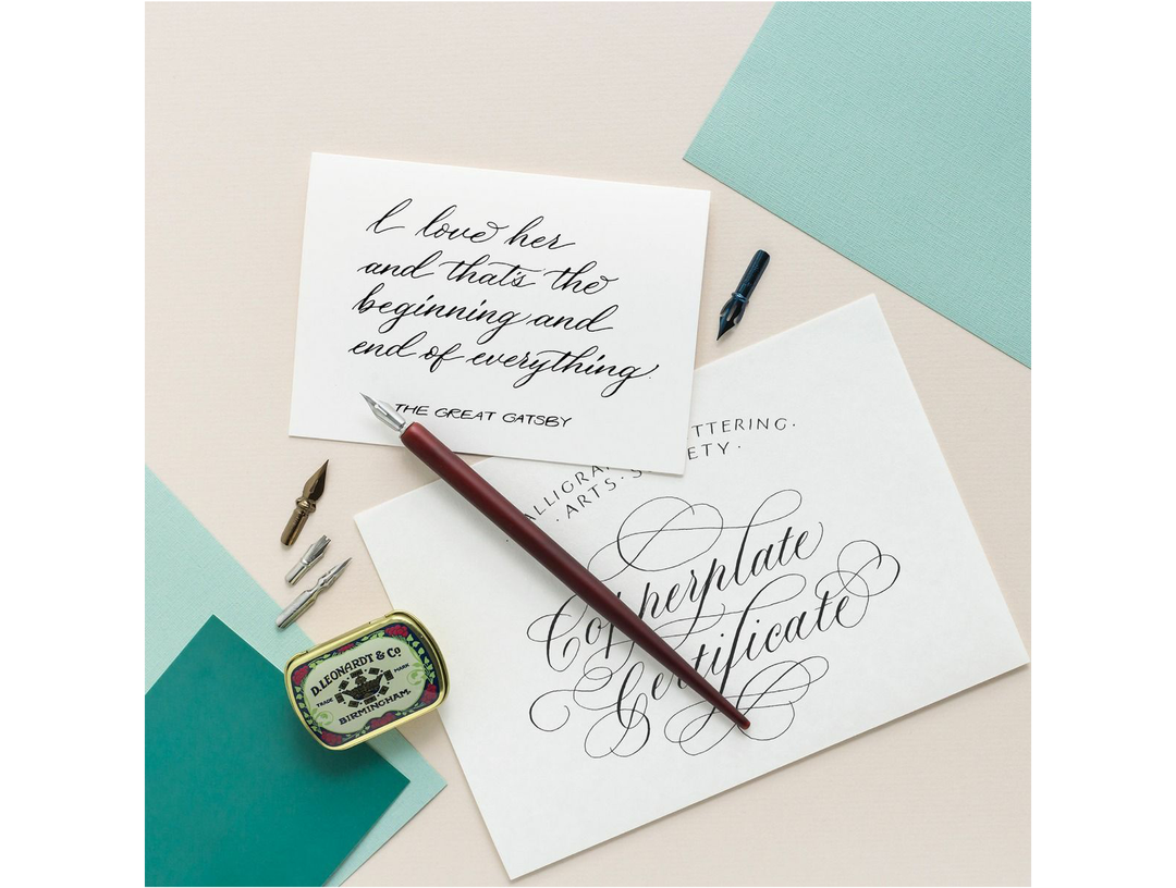 Manuscript parchment paper used for calligraphy writing with pen, ink nibs and handwritten script examples on sheets